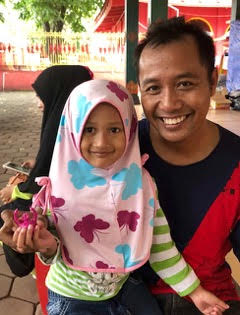 Syd finds a new home in Semarang, Java, Indonesia with Nabula! Syd with Nabula and her dad in Indonesia. What a beautiful family who were so warm and gracious to us. We could tell Syd was meant to go home with them.