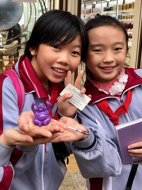 These girls in Haikou, China were beyond thrilled to receive Syd into their lives. Asked for autographs and loved the card describing Purple Syd.